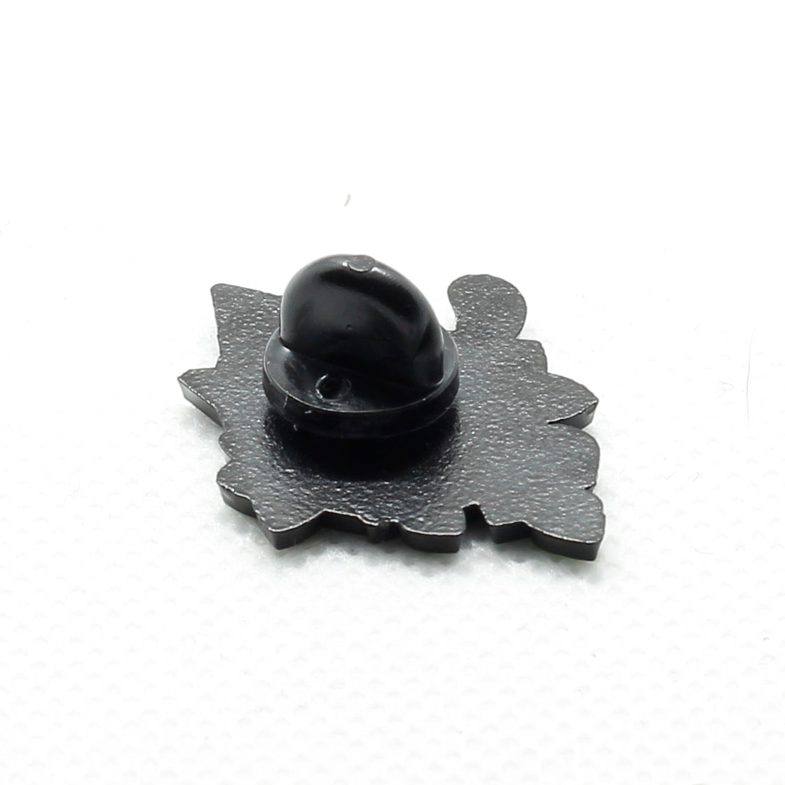 ﻿Back of badge showing butterfly clasp